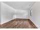 Bright bedroom featuring modern wood-look flooring and a large window for natural light at 1125 Mcdow Dr, Rock Hill, SC 29732