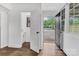 Inviting entryway showcasing natural light, adjacent half bath, and stylish black front door at 1125 Mcdow Dr, Rock Hill, SC 29732