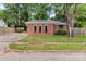 Quaint red brick home with a well-manicured lawn and a convenient carport at 1125 Mcdow Dr, Rock Hill, SC 29732