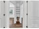 Hallway displaying a built-in shelving unit and coordinating wood-look flooring at 1125 Mcdow Dr, Rock Hill, SC 29732