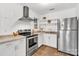 Well-lit kitchen with stainless steel appliances and ample counter space at 1125 Mcdow Dr, Rock Hill, SC 29732