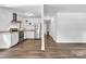 Inviting kitchen with stainless steel appliances, white cabinets, and new wood-look flooring at 1125 Mcdow Dr, Rock Hill, SC 29732
