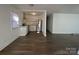 Open living space with modern floors, leading to the kitchen and dining area at 1125 Mcdow Dr, Rock Hill, SC 29732