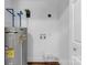 Utility room features an electric water heater and plumbing hookups at 1125 Mcdow Dr, Rock Hill, SC 29732