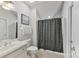 Bathroom with a shower and patterned curtain at 11311 Mcclure Manor Dr, Charlotte, NC 28277