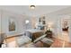 Bedroom offers hardwood floors and an ensuite bathroom at 11311 Mcclure Manor Dr, Charlotte, NC 28277