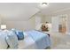 Comfortable bedroom with carpet and access to the hallway at 11311 Mcclure Manor Dr, Charlotte, NC 28277