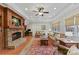 The living room features a fireplace and a tray ceiling at 11311 Mcclure Manor Dr, Charlotte, NC 28277
