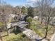 This aerial shot reveals the property's layout, including a detached carport and expansive yard at 1148 Turnbridge Rd, Charlotte, NC 28226
