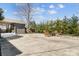 The backyard showcases a concrete patio with chairs around a fire pit, perfect for outdoor gatherings at 1148 Turnbridge Rd, Charlotte, NC 28226