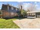 This home features a spacious backyard, complete with a patio, deck, and brick detailing at 1148 Turnbridge Rd, Charlotte, NC 28226