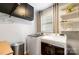 Functional laundry room equipped with modern washer and dryer, overhead cabinets, and ample storage space at 1148 Turnbridge Rd, Charlotte, NC 28226