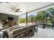 Spacious covered patio with comfortable seating, outdoor dining area, and views of the landscaped backyard at 1148 Turnbridge Rd, Charlotte, NC 28226