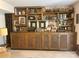 Basement featuring a full wall of wooden shelving, perfect for storage or display at 1220 Nw 20Th Avenue Nw Ave, Hickory, NC 28601