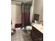 Traditional bathroom featuring a shower-tub combo, vanity, and decorative accents for a comfortable space at 1220 Nw 20Th Avenue Nw Ave, Hickory, NC 28601
