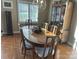 Sun-filled dining room featuring an oval wooden table, stylish chandelier, and hardwood floors at 1220 Nw 20Th Avenue Nw Ave, Hickory, NC 28601