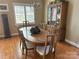 Sun-filled dining room featuring an oval wooden table, stylish chandelier, and hardwood floors at 1220 Nw 20Th Avenue Nw Ave, Hickory, NC 28601