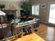 Comfortable living room featuring a stone fireplace, mounted television, and hardwood floors at 1220 Nw 20Th Avenue Nw Ave, Hickory, NC 28601