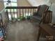 Loft area features plants, a chair and desk overlooking the living space at 1220 Nw 20Th Avenue Nw Ave, Hickory, NC 28601
