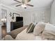 View of the bedroom showing a large dresser with mirror at 125 Ashe St, Gastonia, NC 28056