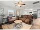 Comfortable living room featuring a ceiling fan, hardwood floors and open floor plan at 125 Ashe St, Gastonia, NC 28056