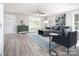 Bright living room with contemporary furnishings, neutral walls, and ample natural light at 1308 Jay Ave, Gastonia, NC 28052