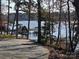 Community dock offering easy access to the lake for boating and fishing, enhancing community living at 140 Sanford Ln, New London, NC 28127