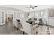 Inviting living room with modern decor, hardwood flooring, and plenty of natural light, perfect for relaxation at 140 Sanford Ln, Badin Lake, NC 28127