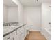 Neutral bathroom with a granite countertop and wood-look flooring at 1520 Doran Ter, Richburg, SC 29729