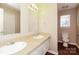 Bathroom featuring dual vanity sinks, mirror, and toilet at 1569 Brentfield Dr, Rock Hill, SC 29732
