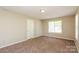 Cozy bedroom with neutral walls, carpet flooring, and natural light at 1569 Brentfield Dr, Rock Hill, SC 29732