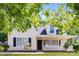 Charming two-story home with covered porch, black shutters, and manicured front yard at 1569 Brentfield Dr, Rock Hill, SC 29732