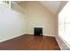 Bright living room features a fireplace, large window, and hardwood floors at 1569 Brentfield Dr, Rock Hill, SC 29732