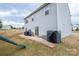Backyard view, showcasing the patio and garden at 1587 Berkshire Dr, Newton, NC 28658