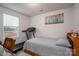 Bedroom with exercise machine, neutral decor, and natural light, providing a versatile and comfortable space at 1587 Berkshire Dr, Newton, NC 28658