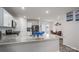 Modern kitchen featuring a granite countertop, a breakfast bar, and stainless steel appliances at 1587 Berkshire Dr, Newton, NC 28658