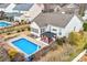 Aerial view of a home featuring a private backyard oasis with a pool and covered patio area at 162 Pecan Hills Dr, Mooresville, NC 28115