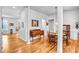Open-concept living space with hardwood floors and elegant dining room at 162 Pecan Hills Dr, Mooresville, NC 28115