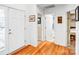 Inviting entryway featuring hardwood floors and white doors at 162 Pecan Hills Dr, Mooresville, NC 28115