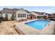 A refreshing in-ground pool with a gazebo, perfect for relaxing and enjoying outdoor living at 162 Pecan Hills Dr, Mooresville, NC 28115