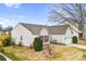 Home's rear exterior showcasing the roofline, siding, and surrounding landscaping at 162 Pecan Hills Dr, Mooresville, NC 28115