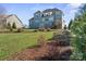 Large, level backyard with green lawn and space for outdoor activities at 190 Hidden Meadows Dr, Mooresville, NC 28117
