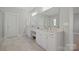 Elegant bathroom with double vanity, granite countertops, and tiled floor at 190 Hidden Meadows Dr, Mooresville, NC 28117