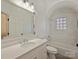 Bathroom features a white vanity with a square mirror and a shower-tub with a patterned tile wall at 2004 Lombardy Cir, Charlotte, NC 28203