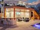 Entertainer's dream backyard with covered patio, bar, and outdoor seating area at 2004 Lombardy Cir, Charlotte, NC 28203
