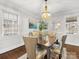 Cozy dining room with elegant chandelier and modern decor at 2009 Charlotte Dr, Charlotte, NC 28203