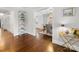 Bright entryway featuring hardwood floors and views into the dining room and living spaces at 2009 Charlotte Dr, Charlotte, NC 28203