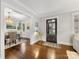 Inviting foyer with hardwood floors and views to dining room, creating a warm welcome at 2009 Charlotte Dr, Charlotte, NC 28203