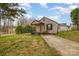 Charming single-story home with a small front porch and a cozy, traditional design at 202 Hovis Rd, Stanley, NC 28164
