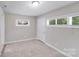 Bedroom featuring natural light, neutral tones, and plush carpet at 2328 Edison St, Charlotte, NC 28206